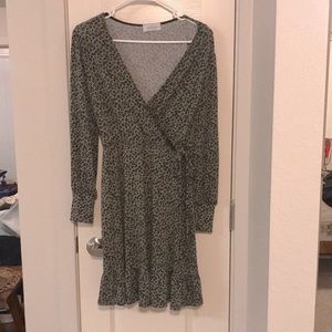 Olive green long sleeve dress with small black flowers.